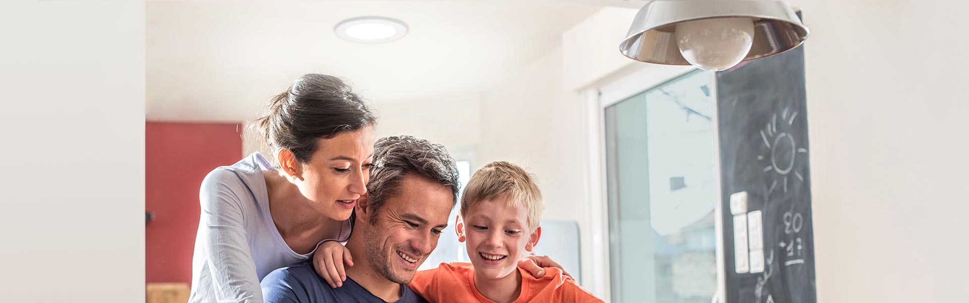 family under Natural Light tubular skylight