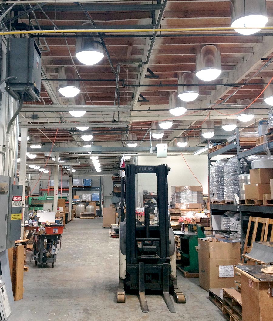 Dozens of Natural Light commercial tubular skylights in manufacturing plant