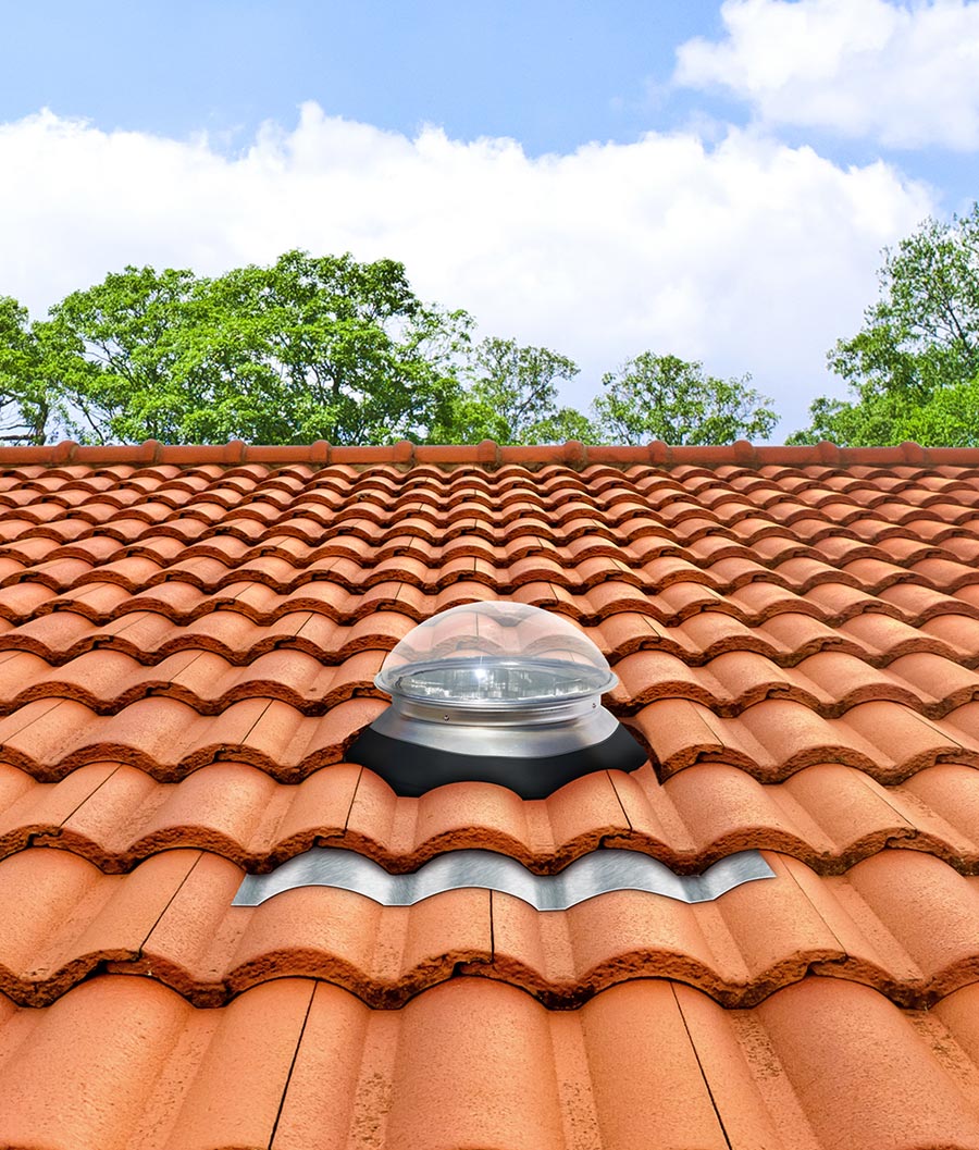 mill finish Natural Light tubular skylight on clay S-tile roof